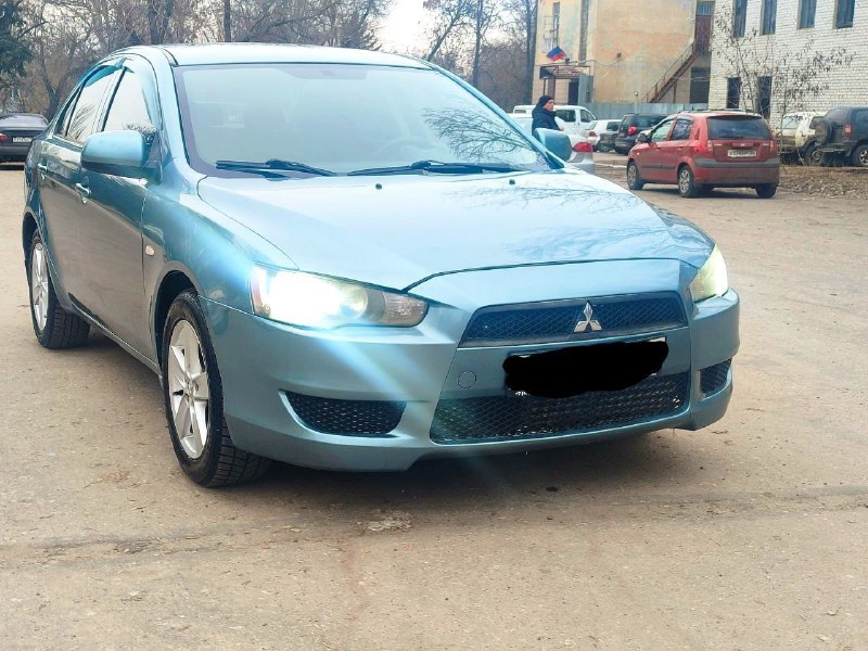 Продам авто Mitsubishi Lancer X 2008г в хорошем состоянии объём 1.8 ( АКПП) подрулевые лепестки Мул...